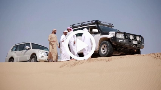 Guys meeting in the desert