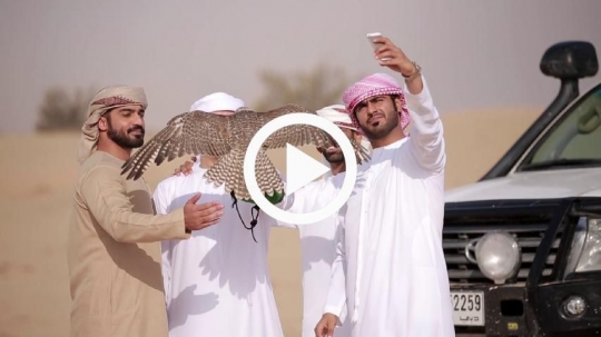 Young men taking a selfie together