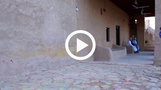 Girl playing hopscotch