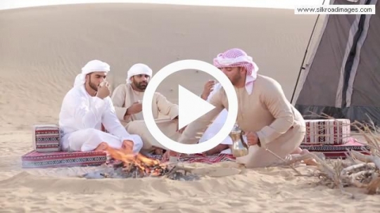 Man serving coffee to friends