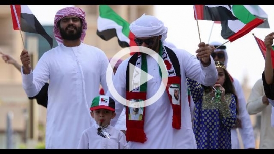 Arab family celebrating the UAE National Day|