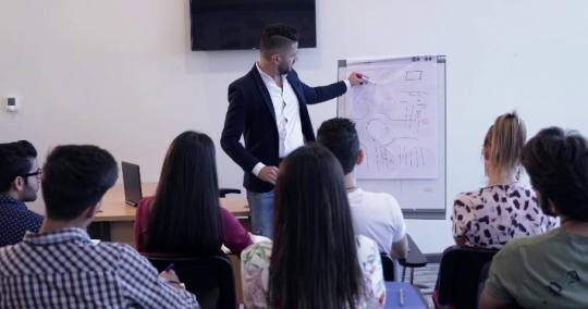 Professor teaching the students |-