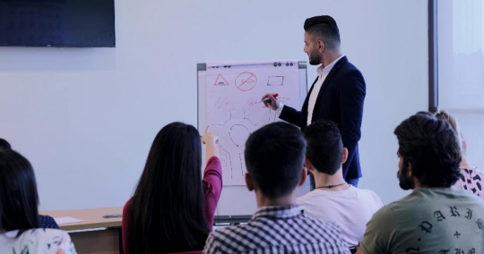 Student asking the professor a question |-