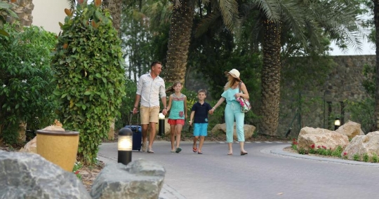 European Family leaving the resort|-