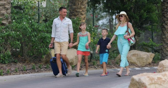 Western Family walking together|-