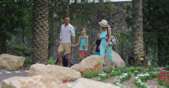 European Family walking together at the resort |-