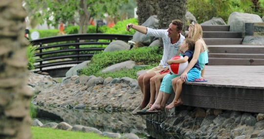 European Family taking a photo together |-