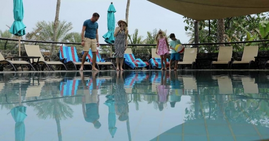 European Family by the pool|-