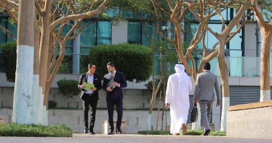 Businessmen walking together |-