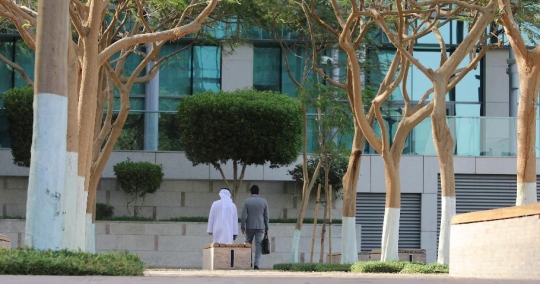 Businessmen walking|-