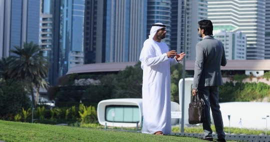 Businessmen talking to each other|-