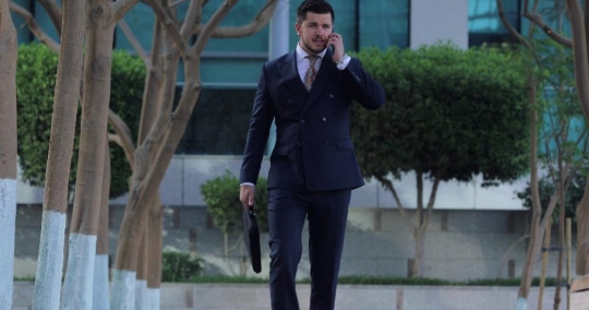 Western Businessman talking on the phone |-