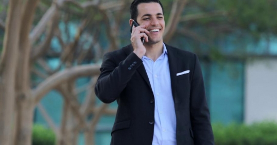 Middle Eastern Businessman on the phone|-