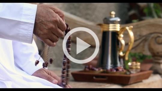 Close up of a man with his Misbahah in his hand|