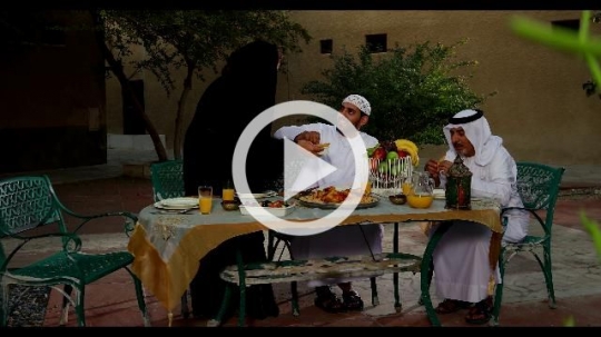 Arab family having iftar together|