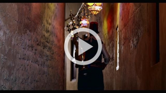 Arabian Ramadan Drink Seller walking through the pathway|