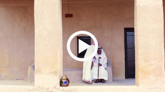 Boy greeting his grandfather outside