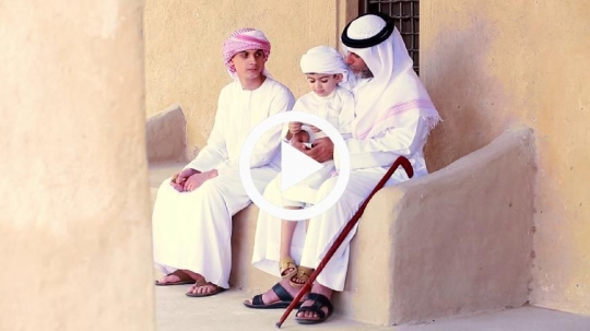 Grandfather giving money to kids