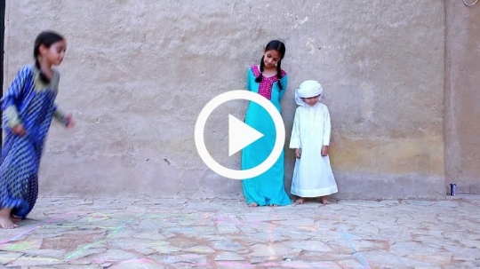 Children playing and jumping outside