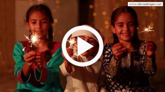 Children holding fiery matches