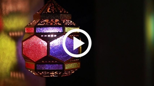 Beautiful lantern in rotation against the wall