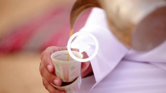 Pouring arabic coffee