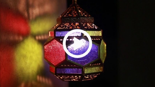 Lantern and color reflected against the wall