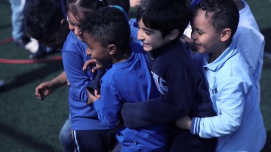 Kids playing all together|-