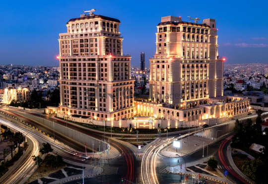 Illuminated Hotel Towers in Amman at Night