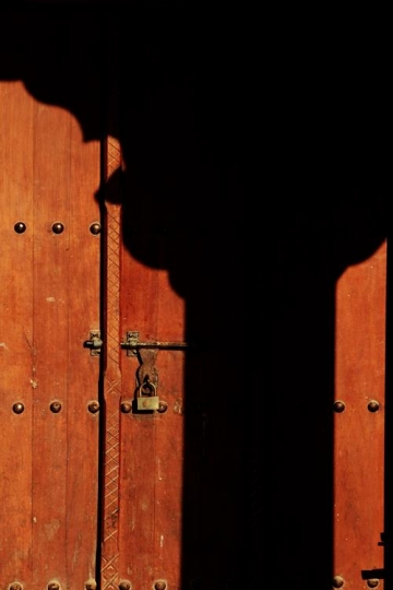 wooden door close up with a lock