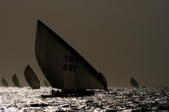 athletes boats sailing