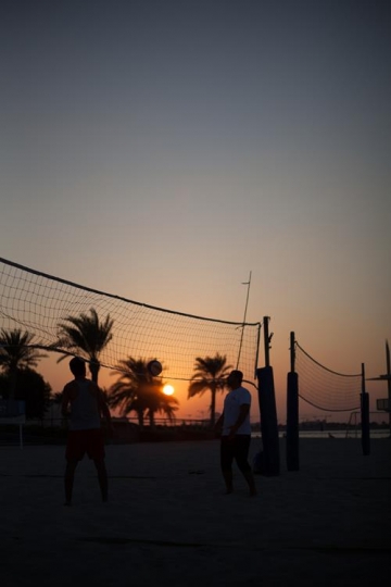 guys playing volleyball