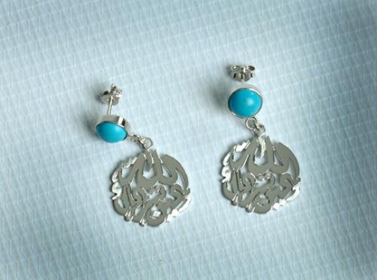 silver earrings with an allah text