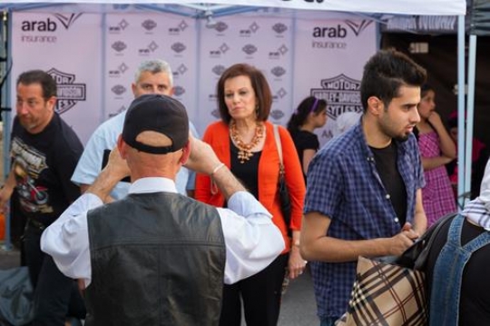 man photographing couple