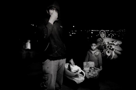 Palestinian Worker with his so