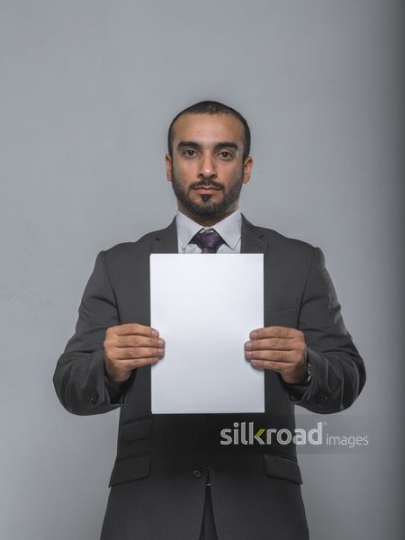 Employee holding a blank paper|