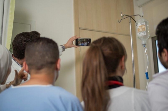 Doctors Taking a Selfie with Patient