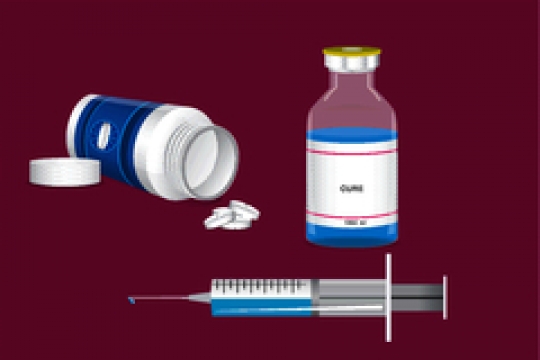 pill bottle with medical ampoules and syringe isolated on red background