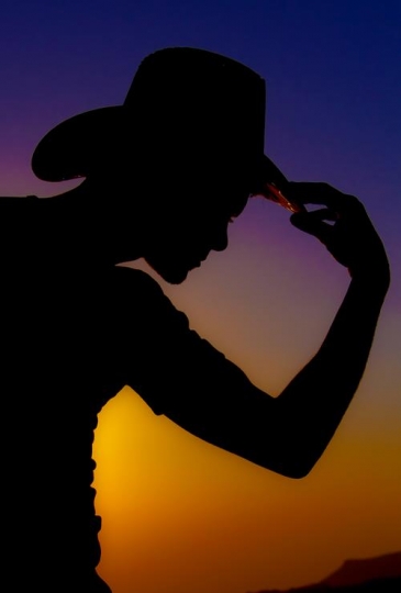 silhouette of a man wearing co