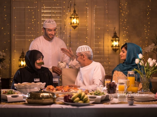 Man perfuming father|-