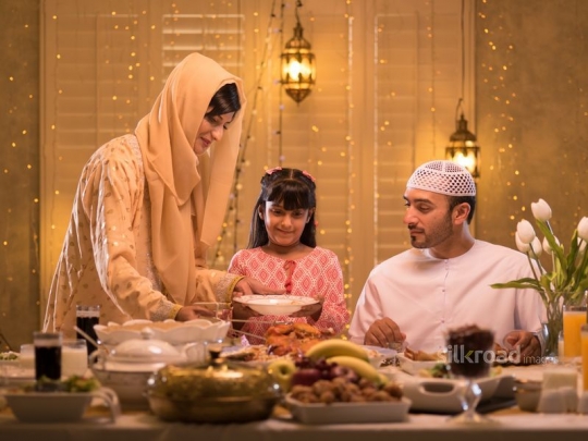 Mother serving food|-