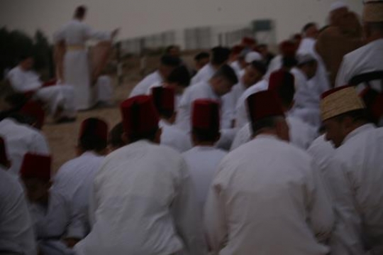 members of the Samaritan community march atop Mount Gerizim, above the West Bank city of Nablus,