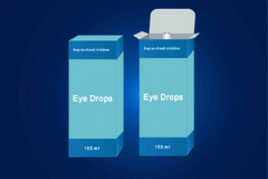 eye drops isolated on blue background