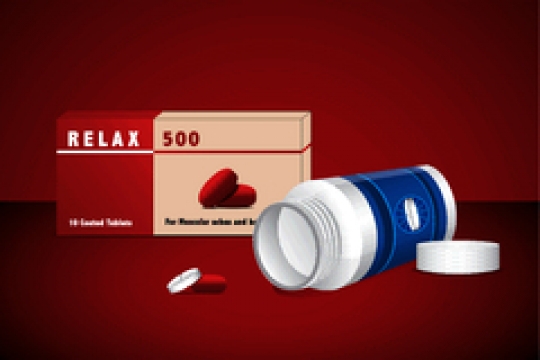 pills in blister pack and pill bottle on red background