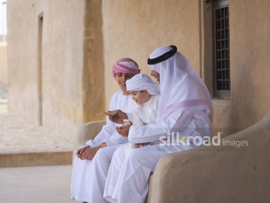 Boys taking money from grandfather|-