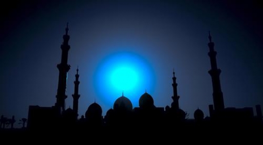 silhouette of mosque , moon light
