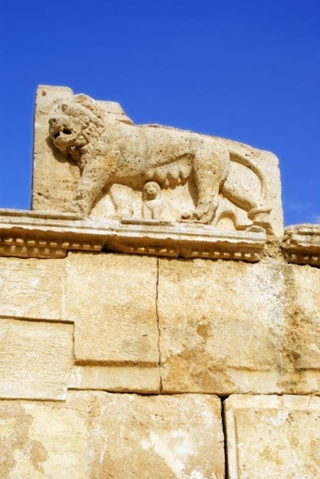 front lion statue made of stone