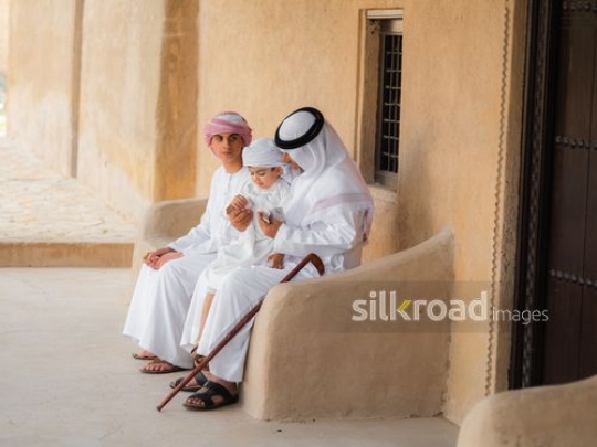 Children taking money from grandfather|-