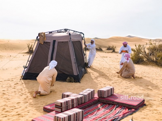 Men mounting the tent
