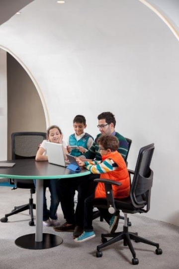 Kids and Teachers at Computer Class